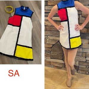 Weissman 60’s inspired costume size SA (Small Adult), headband included.